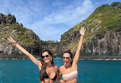Deborah Secco ostenta corpão  durante passeio de lancha